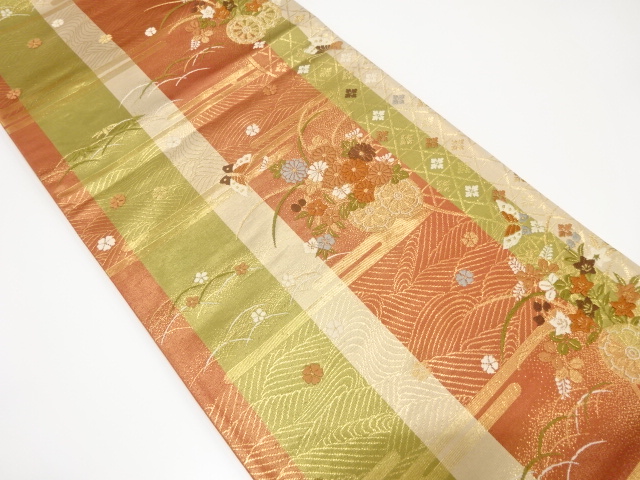 花車に蝶・籠目模様織り出し袋帯